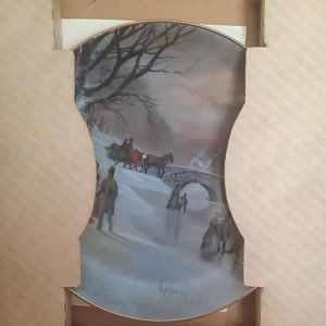 Lloyd Garrison Holiday skates collection plate